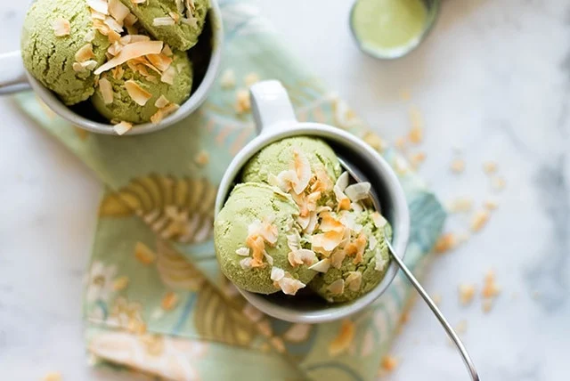Matcha flavored frozen yogurt showing the natural green color achievable in dairy products with proper fat content and pH management