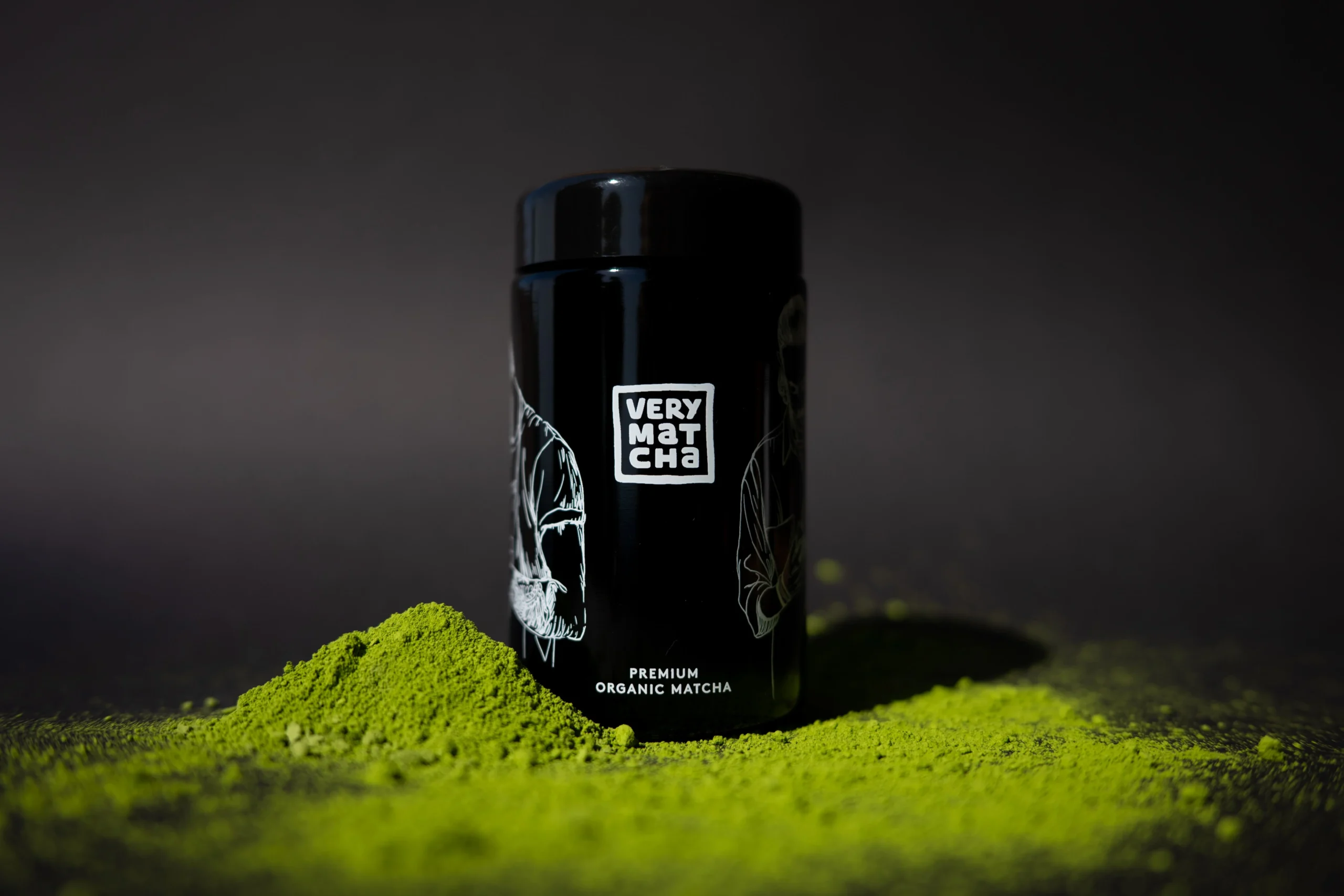 Premium private label matcha packaging - dark aluminum tin canister for ceremonial grade matcha powder product display